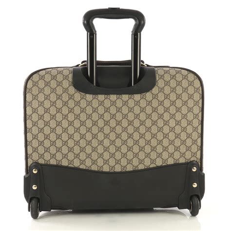 gucci rolling suitcase|Gucci large suitcase.